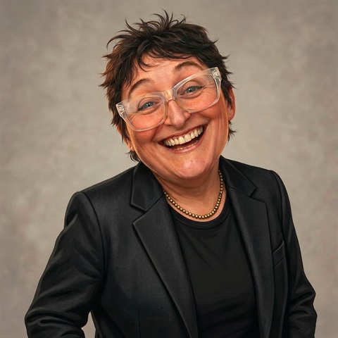Photo of Ms Sam Hicks in a professional photo style with a black shirt, and wearing glasses